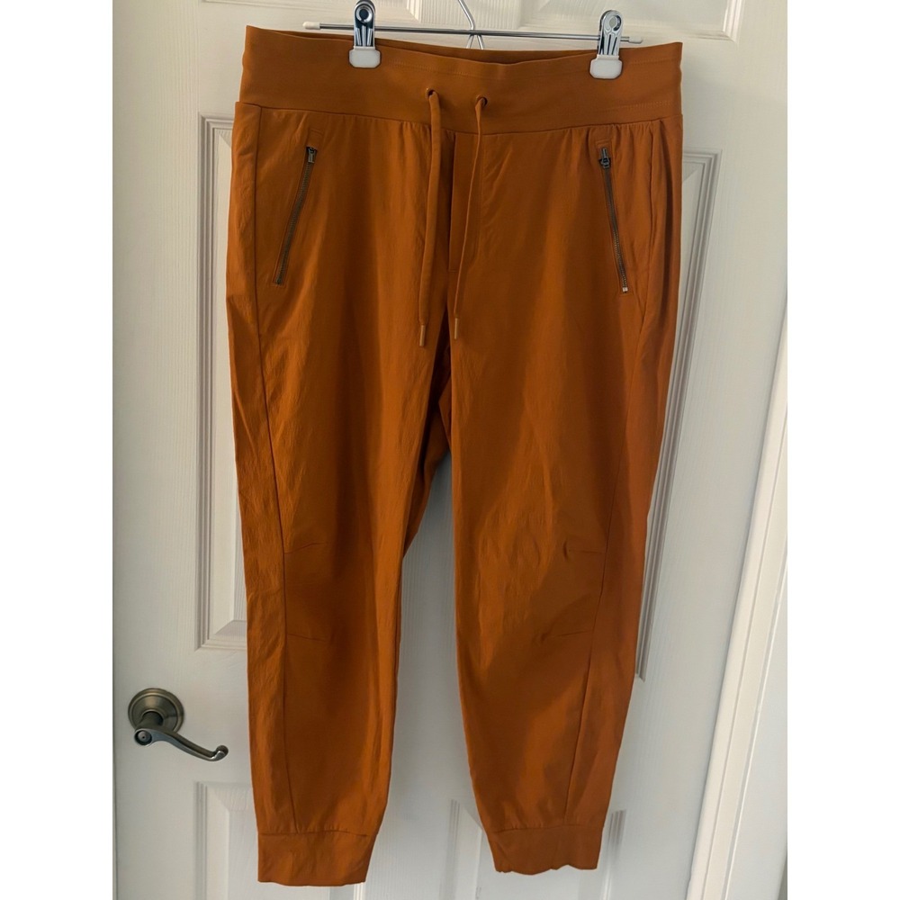 Athleta Trekkie North Jogger Pants Women's 12 Orange Hiking Travel Zip Pocket
